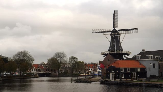 Canal and windmill in Haarlem, the Netherlands.