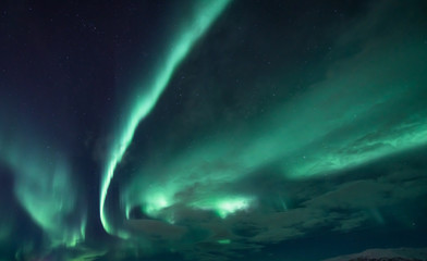 Naklejka na ściany i meble Aurora Borealis in North Norway - Tromso City - Tonsvik
