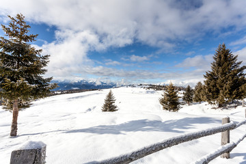 Fototapeta na wymiar snow mountains and blue sky in south tirol winter travel landscape