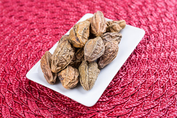Pile of harde pods on a cloth background