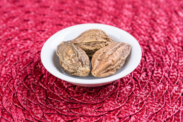 Pile of harde pods on a cloth background