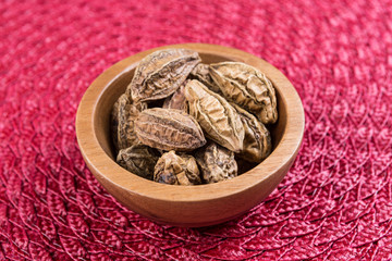 Pile of harde pods on a cloth background