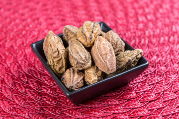 Pile of harde pods on a cloth background