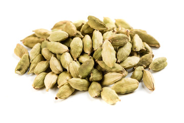 Pile of cardamom pods isolated on a white background