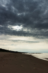 Abandoned fishing boat pier in Baltic sea at latvian coast.