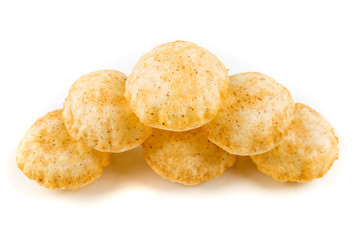 Puffed fried puri isolated on a white background isolated on a white background