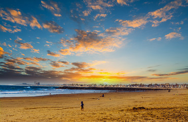 Cloudy sky over Newport Beach at sunset