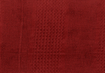 Fototapeta premium Red kitchen towel texture.