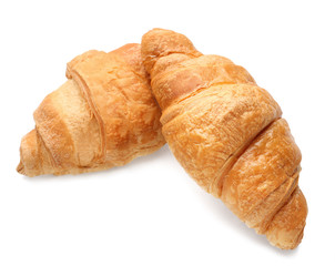 Delicious croissants on white background