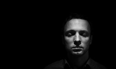 Face portrait of man with closed eyes
