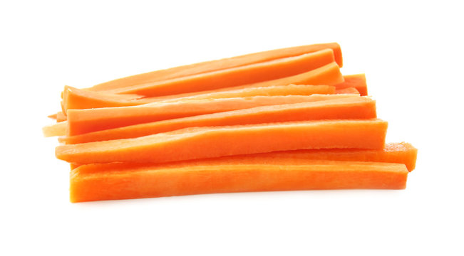 Tasty carrot sticks on white background
