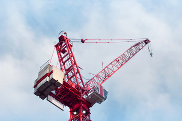 Bright red tower crane