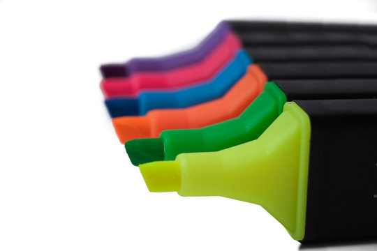 Set Of Highlighter Pens in a row on white background