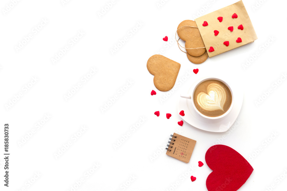 Wall mural Valentines day heart shaped cookies, coffee and calendar with red heart. Top view. Copy space, isolated in white