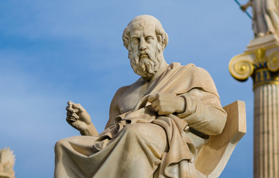 Statue of the great philosopher of ancient Greece Plato, on the background of a marble column.