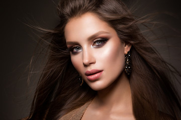 Fototapeta premium Beautiful woman with professional make up and hairstyle