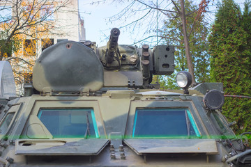 military equipment and tank on the streets of the city
