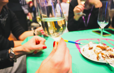 half-empty glass with white wine