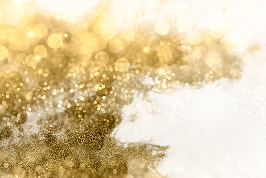 Abstract golden background. Sparkling and twinkling bokeh