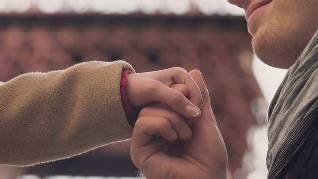 Man kissing woman hand with love and tenderness, acquaintance and first date