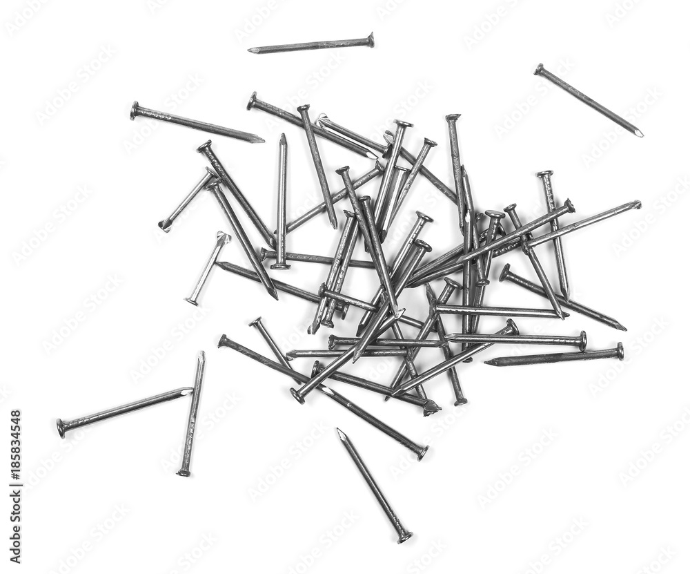 Wall mural pile of metal nails isolated on white background, top view