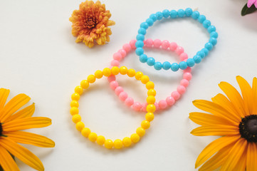 Colored flowers and bracelets