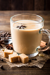 Indian masala chai on rustic wooden table
