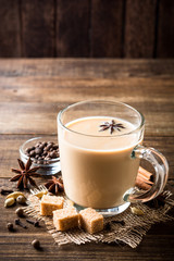 Indian masala chai on rustic wooden table