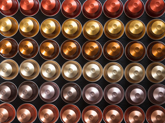 Espresso coffee pods on black background, Top view