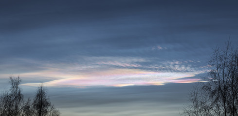 Fototapeta na wymiar Rare polar stratospheric cloud in Southern Finland sky