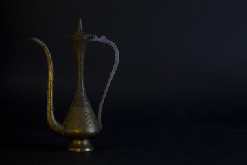 ancient bronze oil container