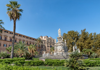 View of Monument to King Philip V of Spain in the Villa Bonanno and Norman Palace in background, Palermo, Italy