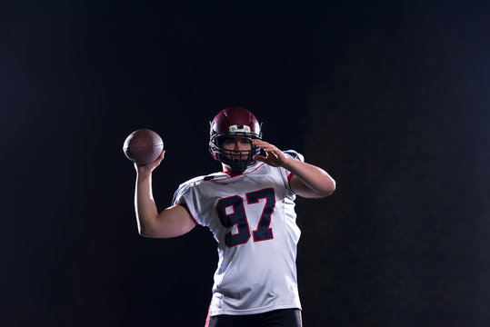 American Football Player Throwing Rugby Ball