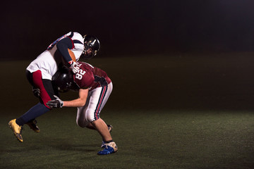 American football players in action