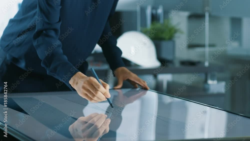 Poster talented young female architectural designer draws building concept on a graphics tablet display ver