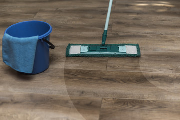 Wet floor cleaning from laminate flooring.