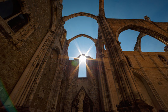Wide angle contre-jour shot of the Convento do Carmo, Convent of Our Lady of Mount Carmel, in Lisbon, Portugal. The Gothic Igreja do Carmo bears the scars of the 1755 earthquake.
