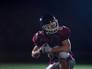 portrait of young confident American football player