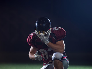 portrait of young confident American football player