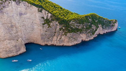 Fototapeta premium Beautiful blue sea and cliffs. Navagio Beach in Zakynthos island, Greece