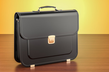 Black leather briefcase on the wooden table. 3D rendering