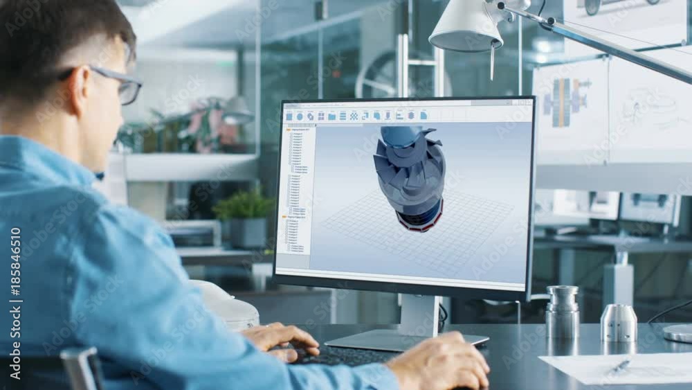 Aufkleber Automotive Engineer Working on a Personal Computer  He's Designing New Efficient Car Engine in CAD Program. He Works in the Bright and Modern Office. Shot on RED EPIC-W 8K Helium Cinema Camera.