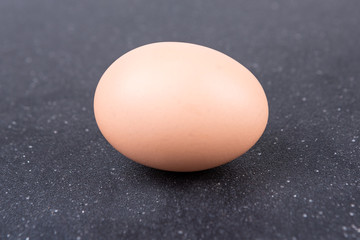 Farm fresh eggs on a black background
