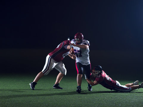American football players in action