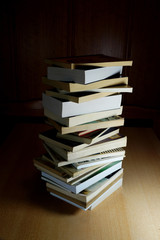 A stack of books in the dark