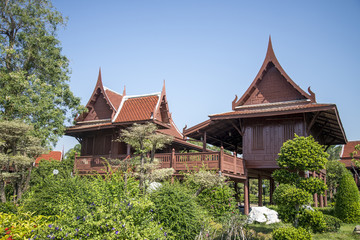 Fototapeta premium Thai style, Teakwood home in garden, Thailand