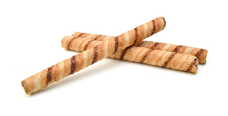 Wafer roll with chocolate and cocoa coating on a white background
