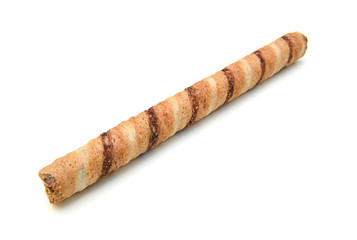 Wafer roll with chocolate and cocoa coating on a white background