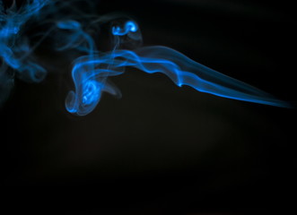 blue Smoke on black background , beautiful smoke,Fluffy Puffs of Smoke