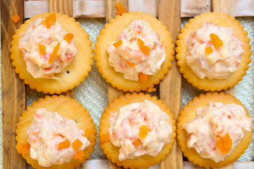 Tasty crackers with cream cheese,carrot.Healthy snacks,